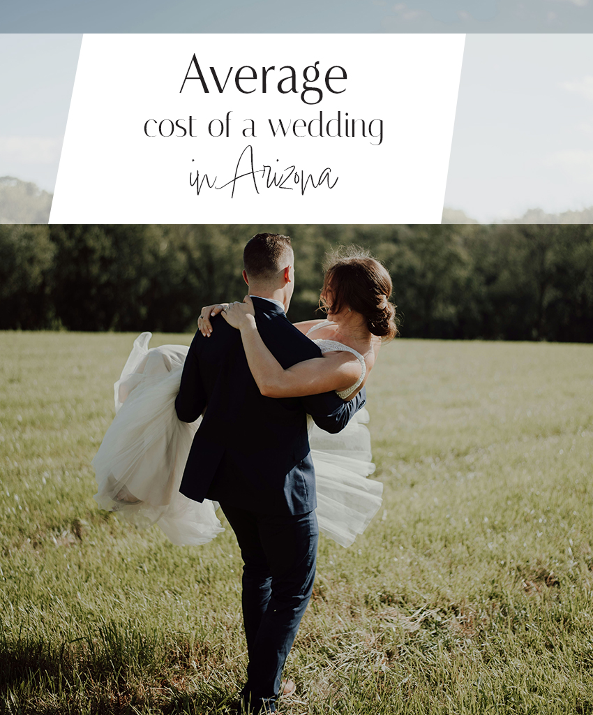A recently wed couple celebrating the joy of knowing they budgeted perfectly for their Arizona Wedding, the groom is holding the bride and they are running through a Arizona green pasture.